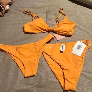 Dippin' Daisy's Vibrant Orange Bikini Set